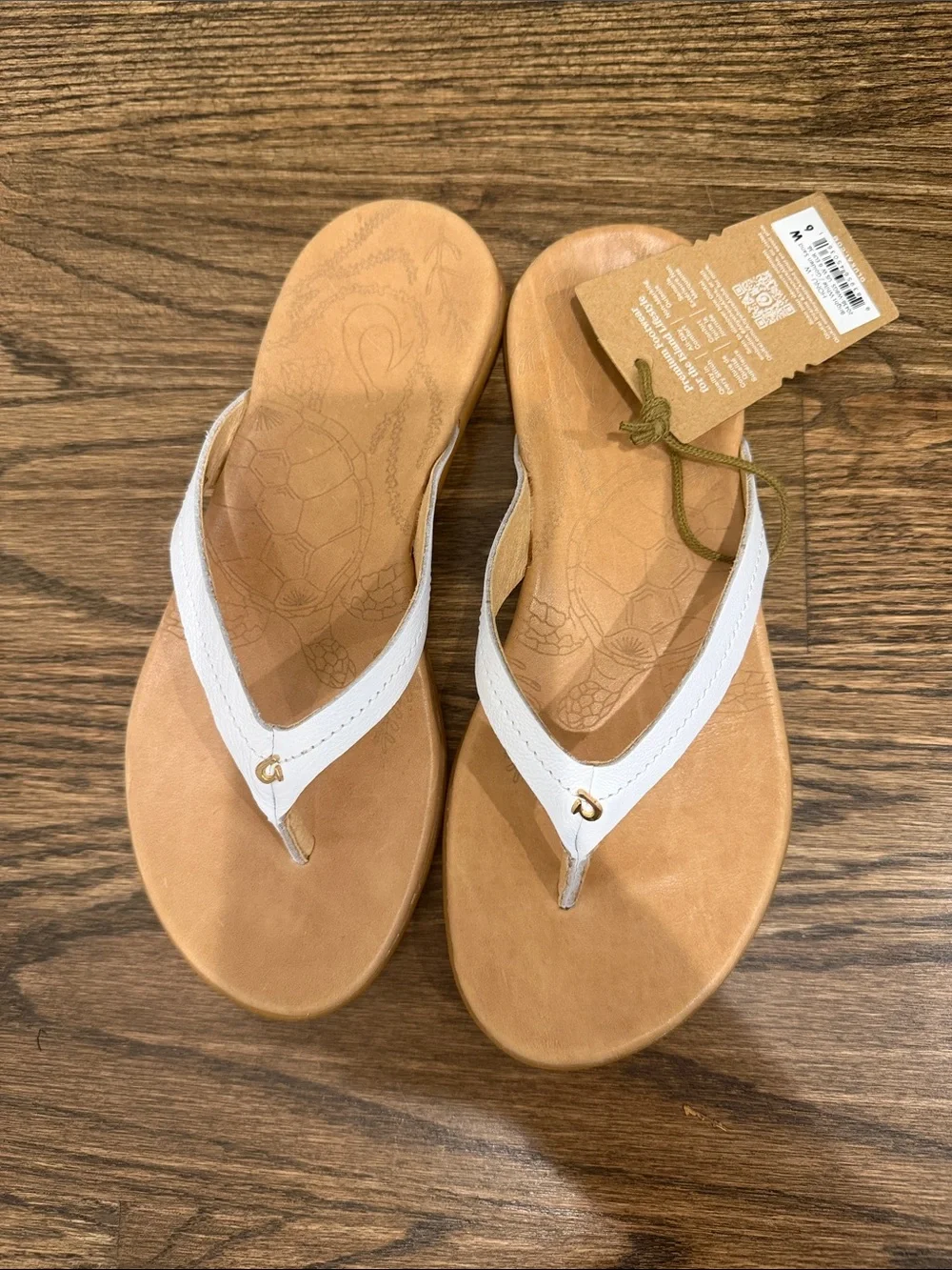 OluKai White Leather Strap Tan Footbed Thongs
